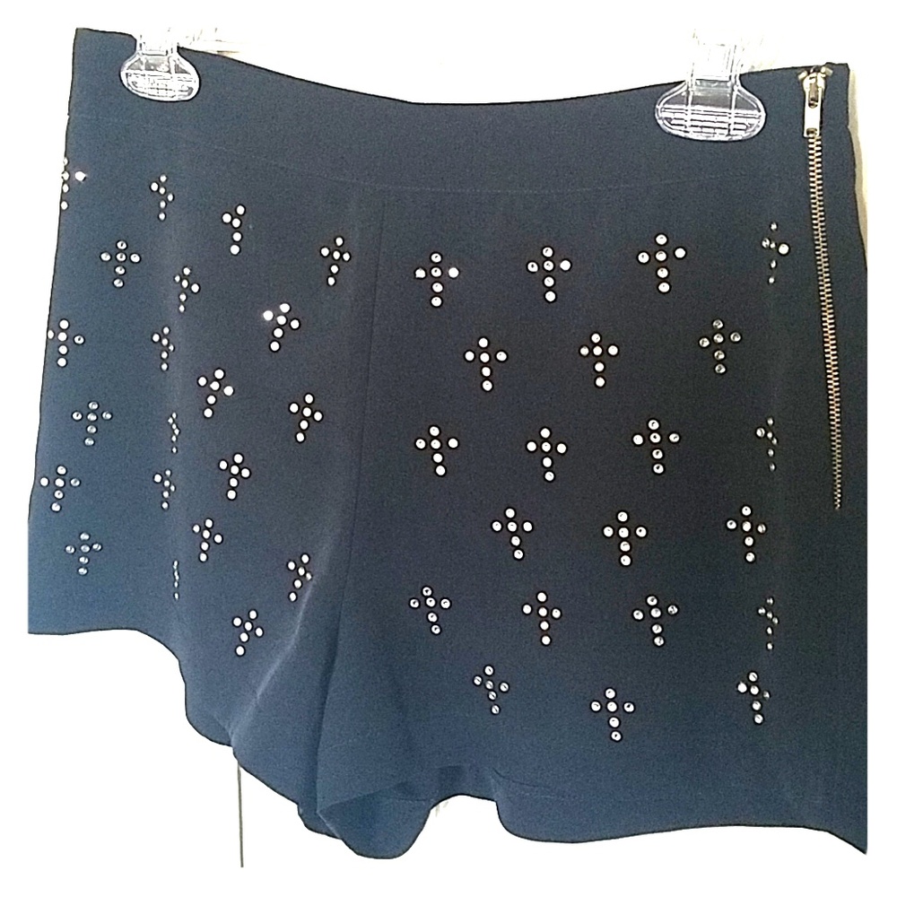 Black Short with round studs in a cross pattern.